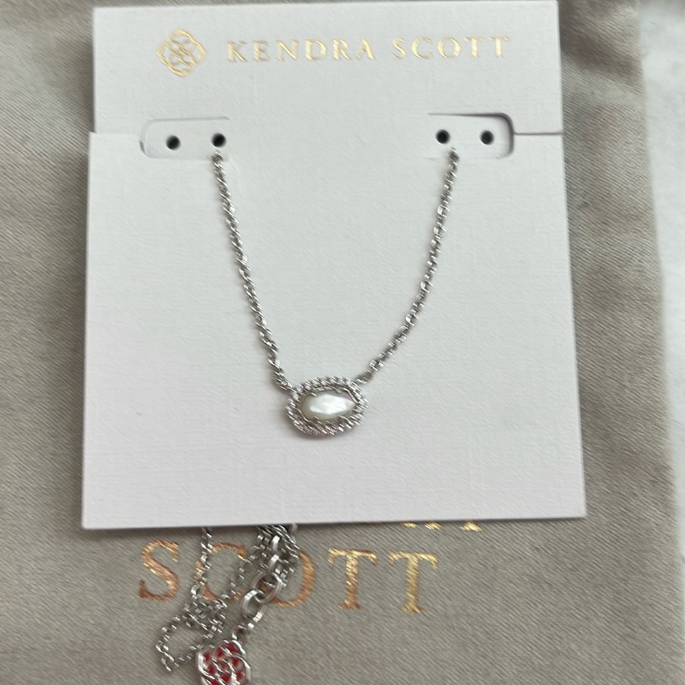 NWT Kendra Scott silver and mother of pearl Chelsea necklace.